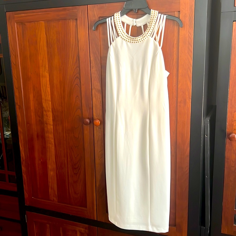Bebe White cocktail dress with flattering cross straps, size 10
